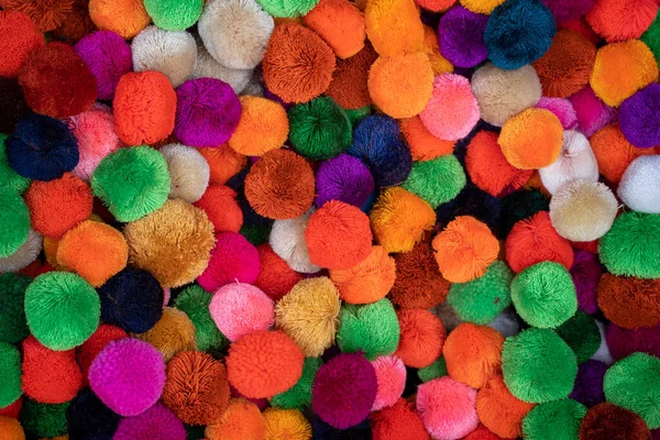 Colorful Mini Pom Poms Background Stock Photo by ©Wirestock 490434716